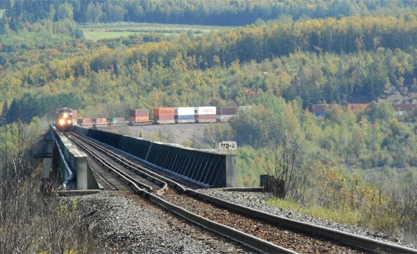 Freight train crossing Salmon River Train Trestle